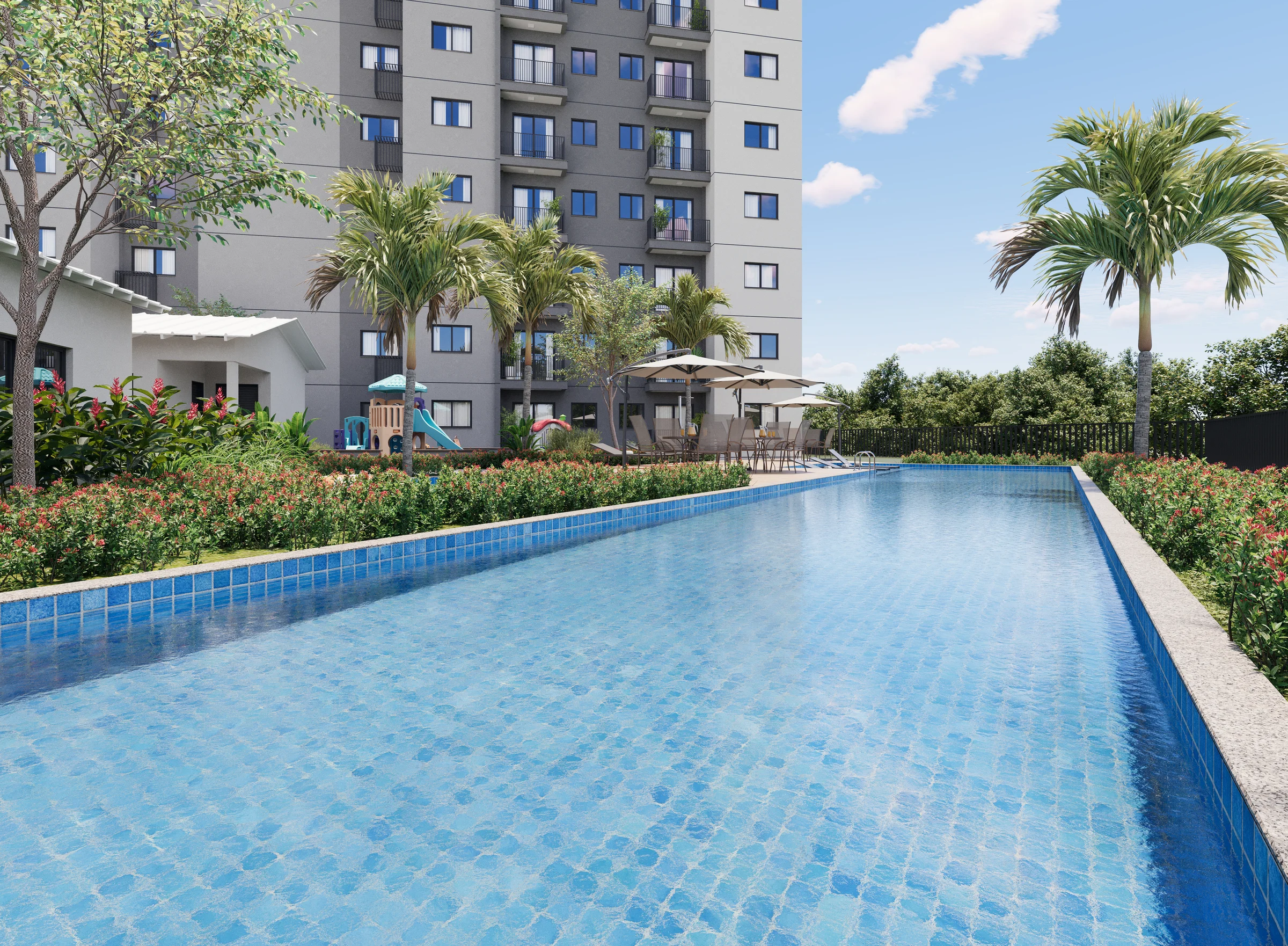 Piscina adulto e infantil com solário e palmeiras ao lado da torre.