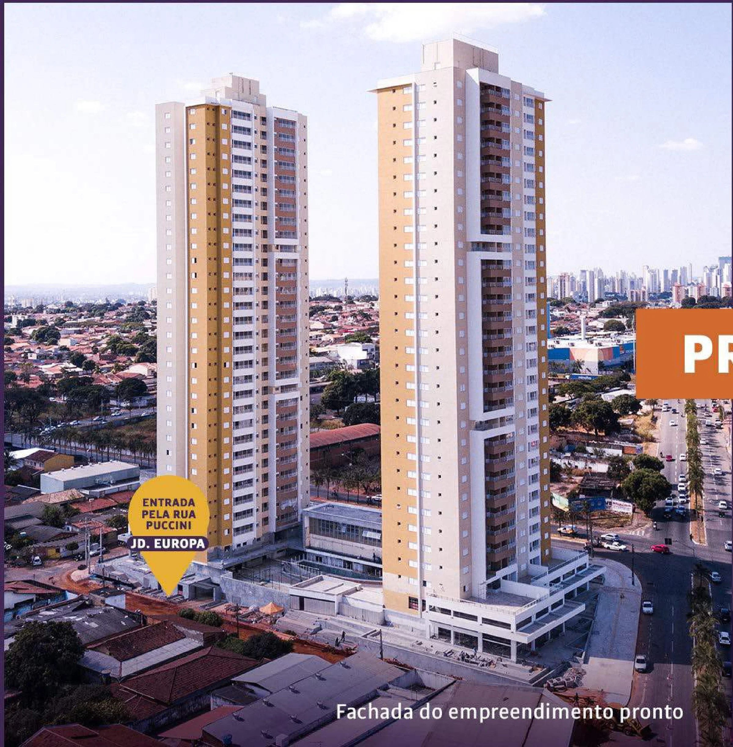 Vista aérea das duas torres residenciais do empreendimento pronto com o entorno urbano
