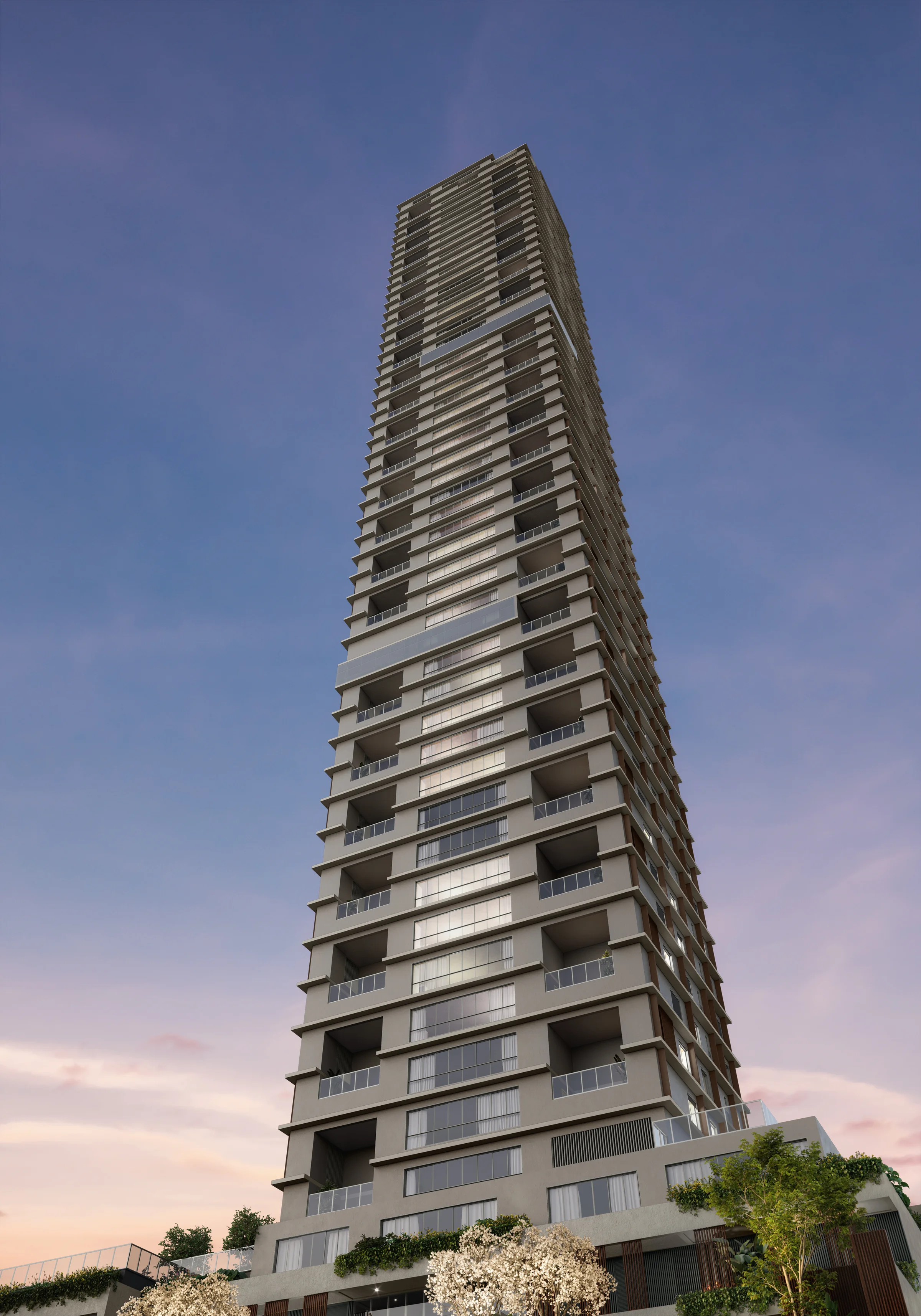 Fachada do edifício vista em ângulo ascendente ao entardecer