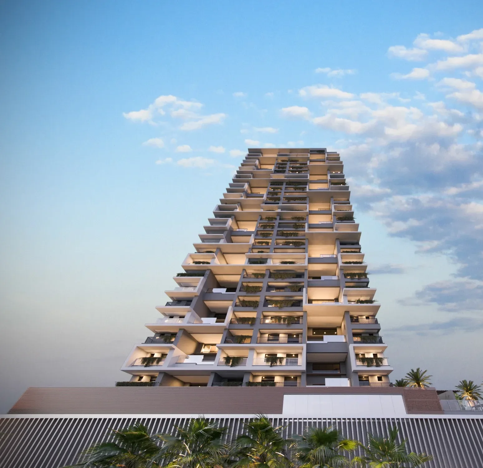 Perspectiva da fachada da torre residencial vista de baixo para cima com iluminação nas varandas