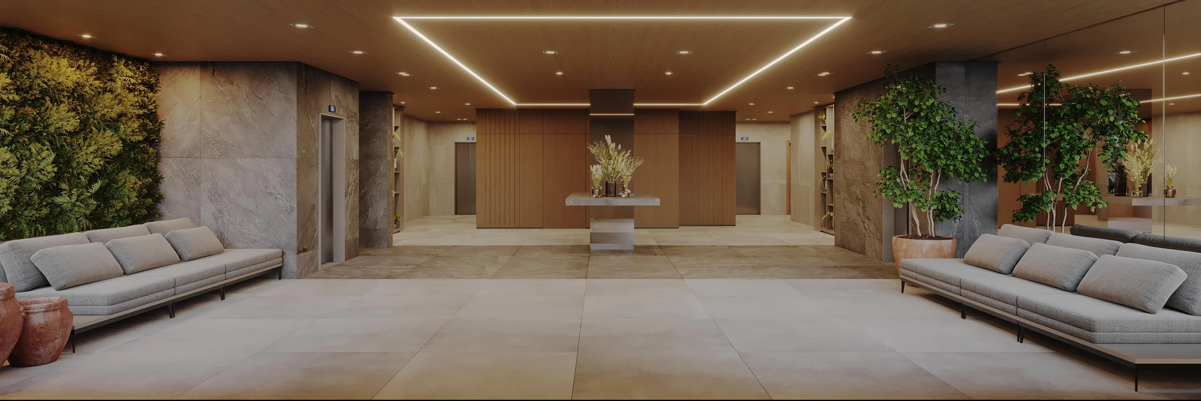 Hall de entrada e lobby com sofás estofados, parede verde natural e iluminação embutida no teto